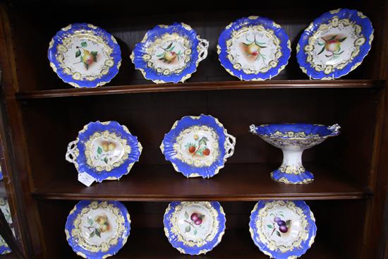 An English porcelain sixteen piece dessert service, mid 19th century, comport 30cm wide